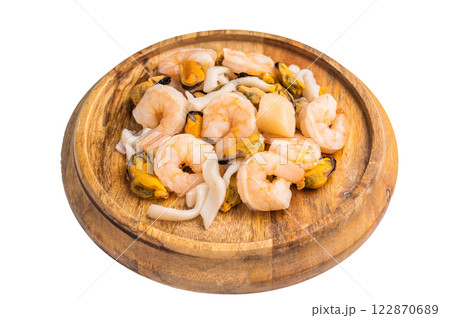 Frozen Raw Seafood Cocktail with Mussels, Clams, Prawns, Shrimps and squid isolated on white background. top view Frozen Raw Seafood Cocktail with Mussels, Clams, Prawns, Shrimps and squid isolated on white background. top view 122870689