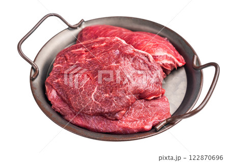 Uncooked beef cheeks, raw meat in steel tray Isolated on white background. top view 122870696