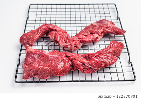 Raw Beef Skirt Steak, Machete steak, uncooked meat isolated on white background 122870701