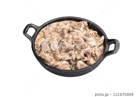 Mushroom beef stroganoff in a skillet isolated on white background. top view 122870808