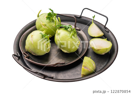 Raw kohlrabi on steel tray, Vegetable from Organic farm isolated on white backround. top view Raw kohlrabi on steel tray, Vegetable from Organic farm isolated on white backround. top view 122870854