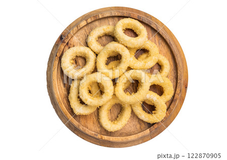 Raw onion rings on wooden board isolated on white background. top view 122870905