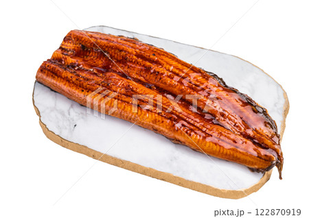 Japanese unagi eel, grilled fish fillet of eel isolated on white background. top view Japanese unagi eel, grilled fish fillet of eel isolated on white background. top view 122870919