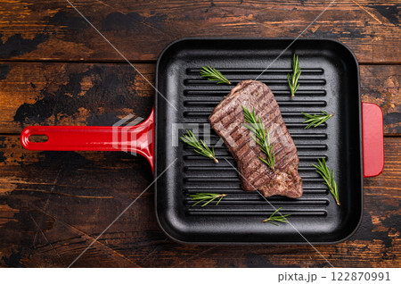 Grilled beef Top sirloin steak or Rump steak in grill pan. wooden background. top view 122870991