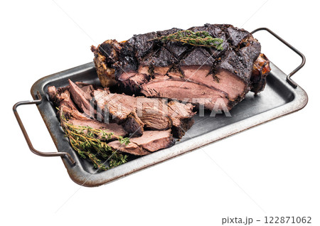 Roasted game meat of Venison, baked leg of roe deer on a tray with herbs isolated on white background. top view 122871062