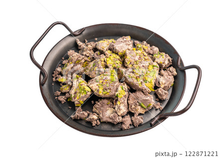 Halva with tahini and pistachio isolated on a white background. Natural vegan sweets 122871221