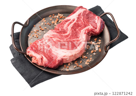Uncooked Raw Chuck eye roll steak, prime beef meat in kitchen tray isolated on white background 122871242