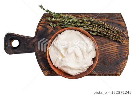 Dip sauce with Fresh Sour cream in a bowl isoalted on white background. top view 122871243