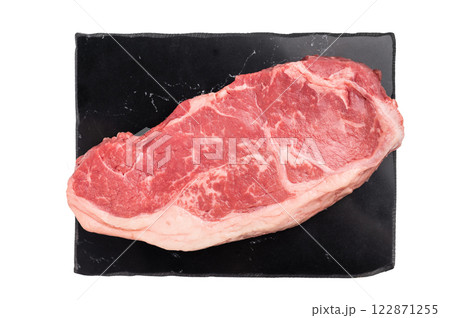 Raw striploin beef steak, New York strip steak isolated on white background Raw striploin beef steak, New York strip steak isolated on white background 122871255