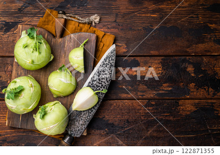 Cabbage kohlrabi on wooden board, raw Organic Vegetable. wooden backround. top view 122871355