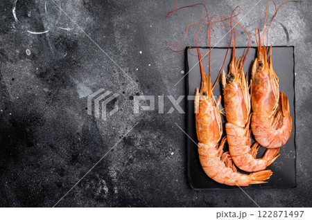 Fresh red Argentine shrimps, raw Prawns Langostino Austral. black background. top view 122871497