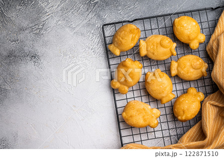 Korean pancake Bungeoppang, Fish shaped Waffle with sweet red bean filling. white background. top view 122871510