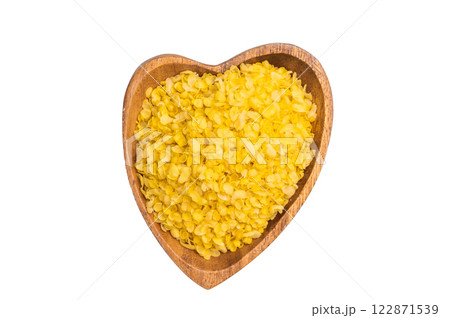Millet flakes in wooden bowl, rolled millet for porridge and muesli isolated on white background. top view 122871539