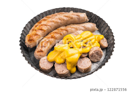 Grilled Bratwurst Sausages with cheese sauce in plate isolated on white background. top view Grilled Bratwurst Sausages with cheese sauce in plate isolated on white background. top view 122871556