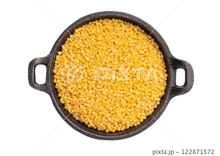 raw Dry Ptitim pasta, Israeli couscous isolated on white background. top view raw Dry Ptitim pasta, Israeli couscous isolated on white background. top view 122871572