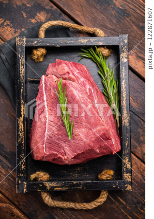 Raw Ostrich meat, fresh Game Meat. wooden background. top view 122871607