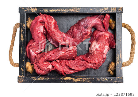 Beef cut Machete Skirt Steak, raw marble meat in wooden tray isolated on white background Beef cut Machete Skirt Steak, raw marble meat in wooden tray isolated on white background 122871695