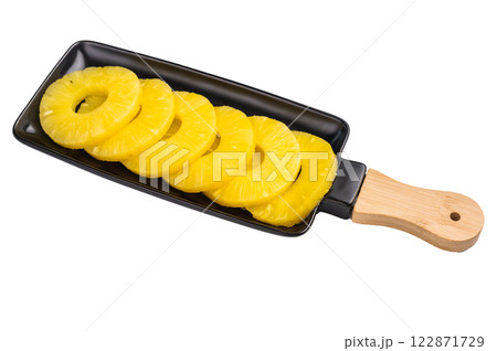 Canned Pineapple rings slices on a board isolated on white background. top view 122871729