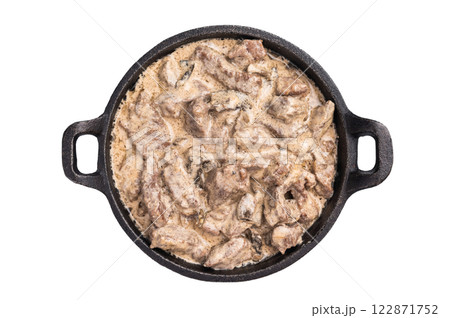 Mushroom beef stroganoff in a skillet isolated on white background. top view Mushroom beef stroganoff in a skillet isolated on white background. top view 122871752