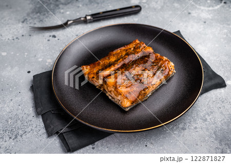 Japanese Teriyaki salmon fish fillet with sauce glaze. grey background. top view 122871827