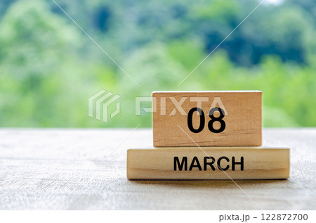 8 March calendar on wooden table with customizable space for text, ideas or messages. Calendar and copy space concept 122872700