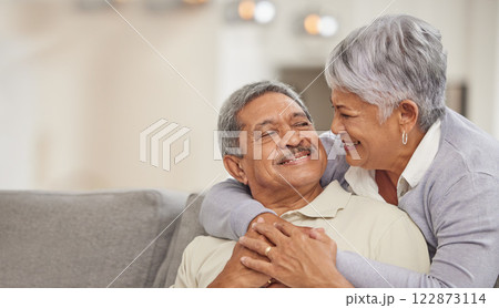 Relax, retirement and senior Mexico couple on sofa at home enjoying free time with smile, hug and love. Happy, comfortable and relationship of elderly man and woman on couch in living room together Relax, retirement and senior Mexico couple on sofa at home enjoying free time with smile, hug and love. Happy, comfortable and relationship of elderly man and woman on couch in living room together 122873114