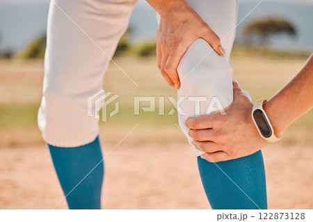 Sport, baseball and pain or injury for legs of athlete, player or sports woman on a baseball field. Emergency, accident and hurt girl holding knee after fitness, exercise and game training workout Sport, baseball and pain or injury for legs of athlete, player or sports woman on a baseball field. Emergency, accident and hurt girl holding knee after fitness, exercise and game training workout 122873128