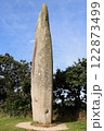 Menhir Kerloas is a famous ancient standing stone in Brittany, France. 122873499