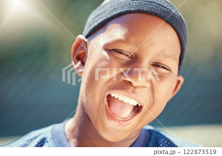 Fitness, a smile on face and a black child on basketball court in summer. Game, sport and happy healthy kid outside on school sports ground. Exercise, wellness and fun, boy playing in the sun in park 122873519