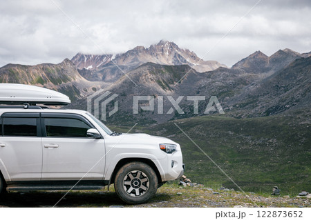 Offroad car on high elevation mountains Offroad car on high elevation mountains 122873652