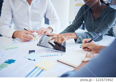 Hands of team with tablet and paperwork for planning company business meeting, collaboration and teamwork. Management, diversity and corporate staff writing in notebook success strategy for agency 122873902