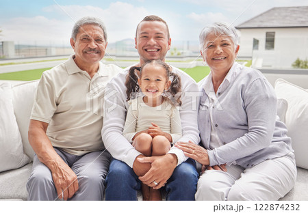 Big family portrait with child and grandparents on outdoor patio lounge in Mexico for summer holiday or vacation. Happy interracial father, kid and grandmother smile together with blue sky sunshine 122874232