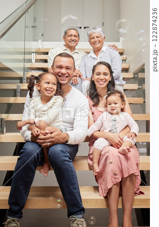 Kids portrait, happy family and parents with grandparents on stairs, smile at birthday celebration and love in house together. Elderly grandmother and man with children on steps to celebrate holiday 122874236