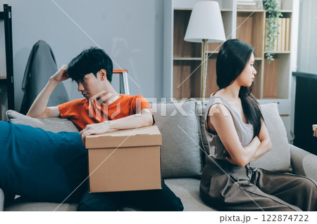 Stressed young married family couple arguing, blaming each other Stressed young married family couple arguing, blaming each other 122874722