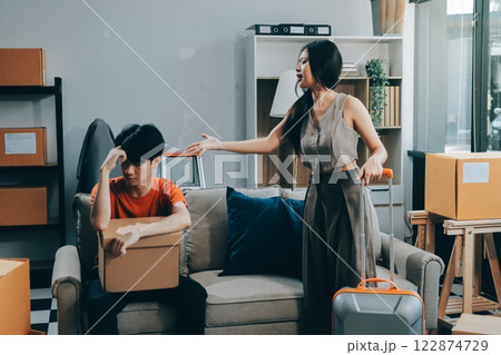 Stressed young married family couple arguing, blaming each other Stressed young married family couple arguing, blaming each other 122874729