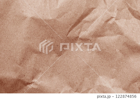 Elegant mocha mousse background on crumpled kraft paper texture. Mocha mousse grunge texture background. Elegant mocha mousse background on crumpled kraft paper texture. Mocha mousse grunge texture background. 122874856