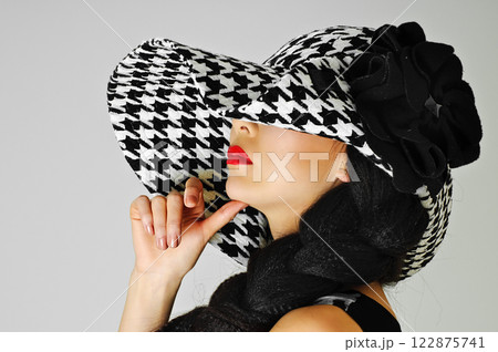 red lips and white black hat 122875741