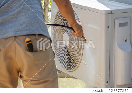 air conditioning compressor outdoor unit cleaning service with water spray air conditioning compressor outdoor unit cleaning service with water spray 122877273