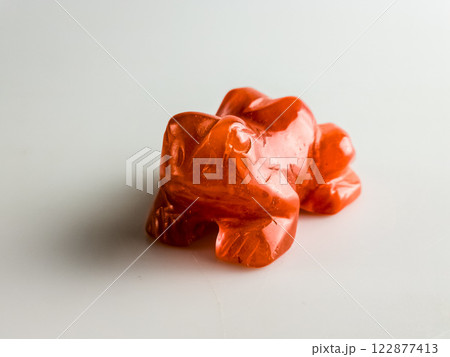 Carnelian frog bringing good luck on a white background. 122877413
