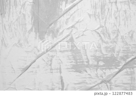 Gray color on white crumpled and creased paper poster texture background Gray color on white crumpled and creased paper poster texture background 122877483