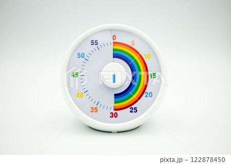Colorful circular kids timer with rainbow sections and white frame 122878450
