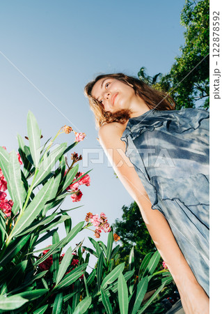 Cinematic fashion meets botanical beauty fresh angles, radiant glow, and bold nature contrasts Cinematic fashion meets botanical beauty fresh angles, radiant glow, and bold nature contrasts 122878592