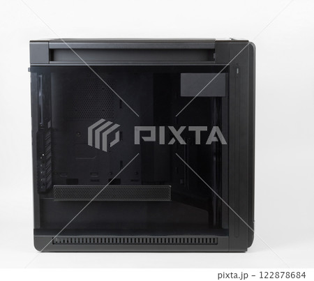 Side view of empty big tower, PC case, chassis, tempered-glass left panel has a mesh window to aid in graphics-card ventilation Side view of empty big tower, PC case, chassis, tempered-glass left panel has a mesh window to aid in graphics-card ventilation 122878684