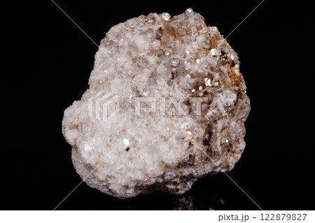 Macro mineral stone Albit on black background 122879827