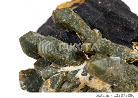 Macro mineral stone Quartz Hedenbergite Prase on ilvite on a white background Macro mineral stone Quartz Hedenbergite Prase on ilvite on a white background 122879886