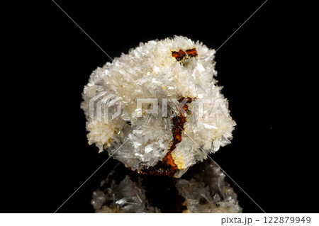 Macro mineral stone crystals Hemimorphite rock on a black background 122879949