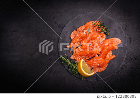 Traditional Norwegian fresh salmon in slices Traditional Norwegian fresh salmon in slices 122880805