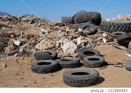 Tyres lies on the dump, abuse of environment Tyres lies on the dump, abuse of environment 122880883