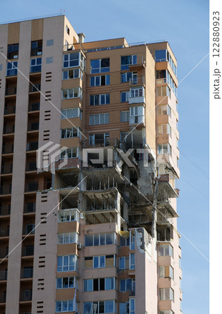 Russian terrorist army damaged by a missile dwelling house in Kyiv city, Ukraine Russian terrorist army damaged by a missile dwelling house in Kyiv city, Ukraine 122880923