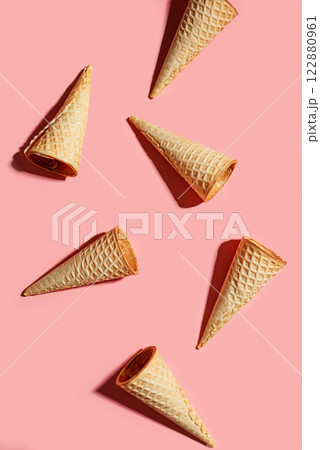 Ice cream waffle cones on pink Ice cream waffle cones on pink 122880961